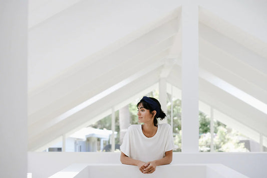 Model in the Knotted Headband and Relaxed Tee at Home