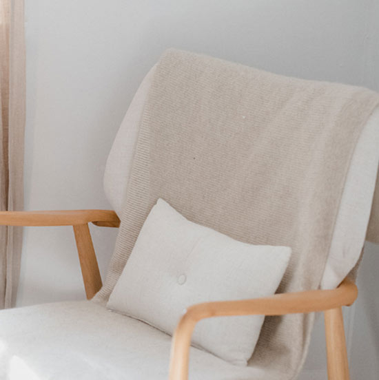SOL loungewear conscious living blog: peaceful scene with chair inviting rest and relaxation