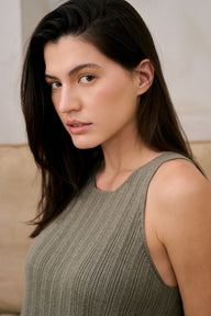 Model wearing ribbed tank in sage leaf close up