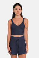 Model wearing Deep Navy shorts with matching tank