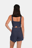 Back view of model wearing Deep Navy shorts with matching tank