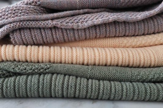 Stack of SoL Sustainable Knitwear Collection